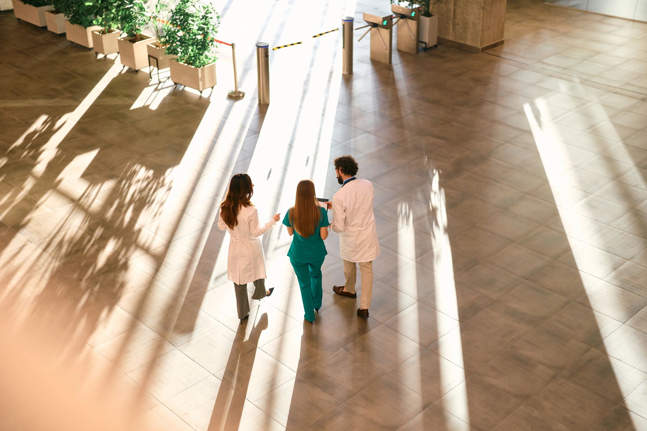Healthcare team collaborating in a hospital lobby