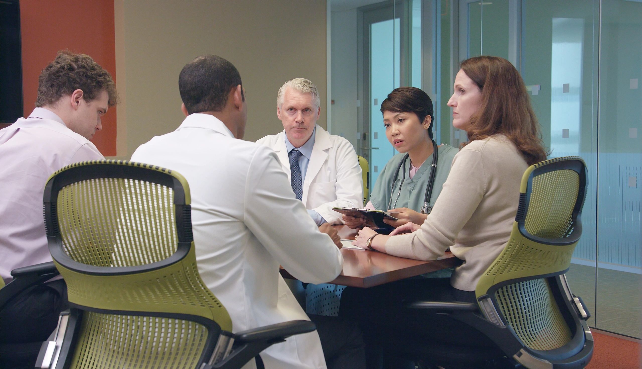 Healthcare professionals meeting in a modern office